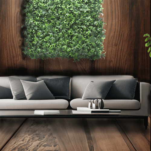 Pourquoi mettre des murs végétaux artificiels ? : photo avec un salon dans lequel le mur végétal ajoute du cachet à la pièce